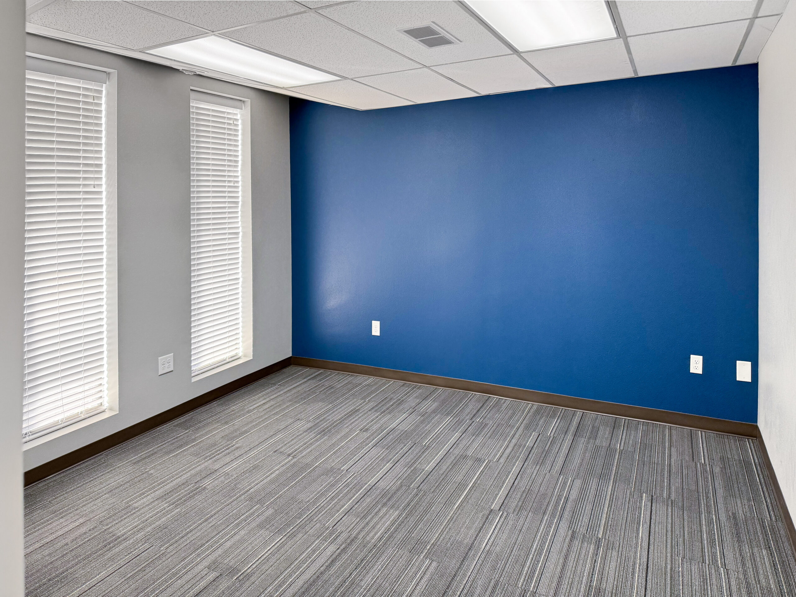 Financial Institution branch office -- private office with blue accent wall