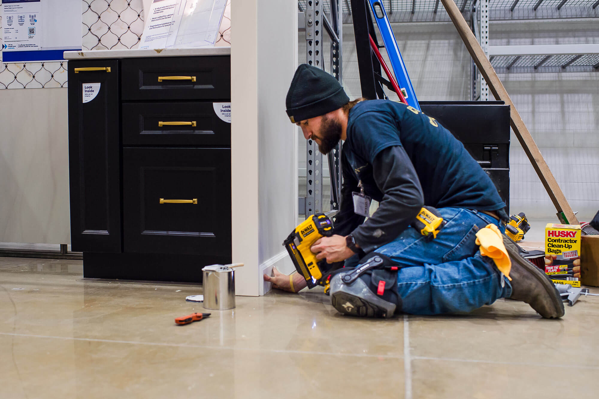 Crew installing base trim